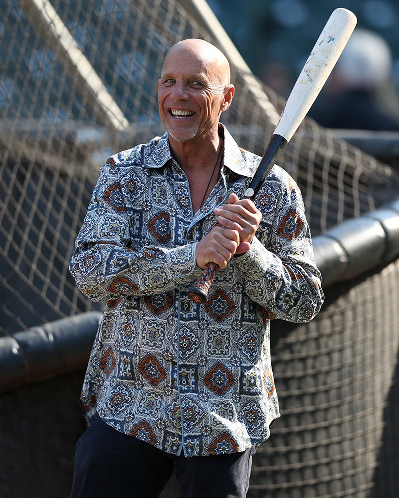 Tim Flannery holding bat