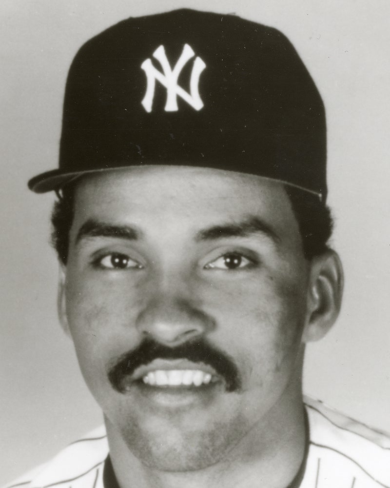Head and shoulders portrait of Henry Cotto in Yankees uniform