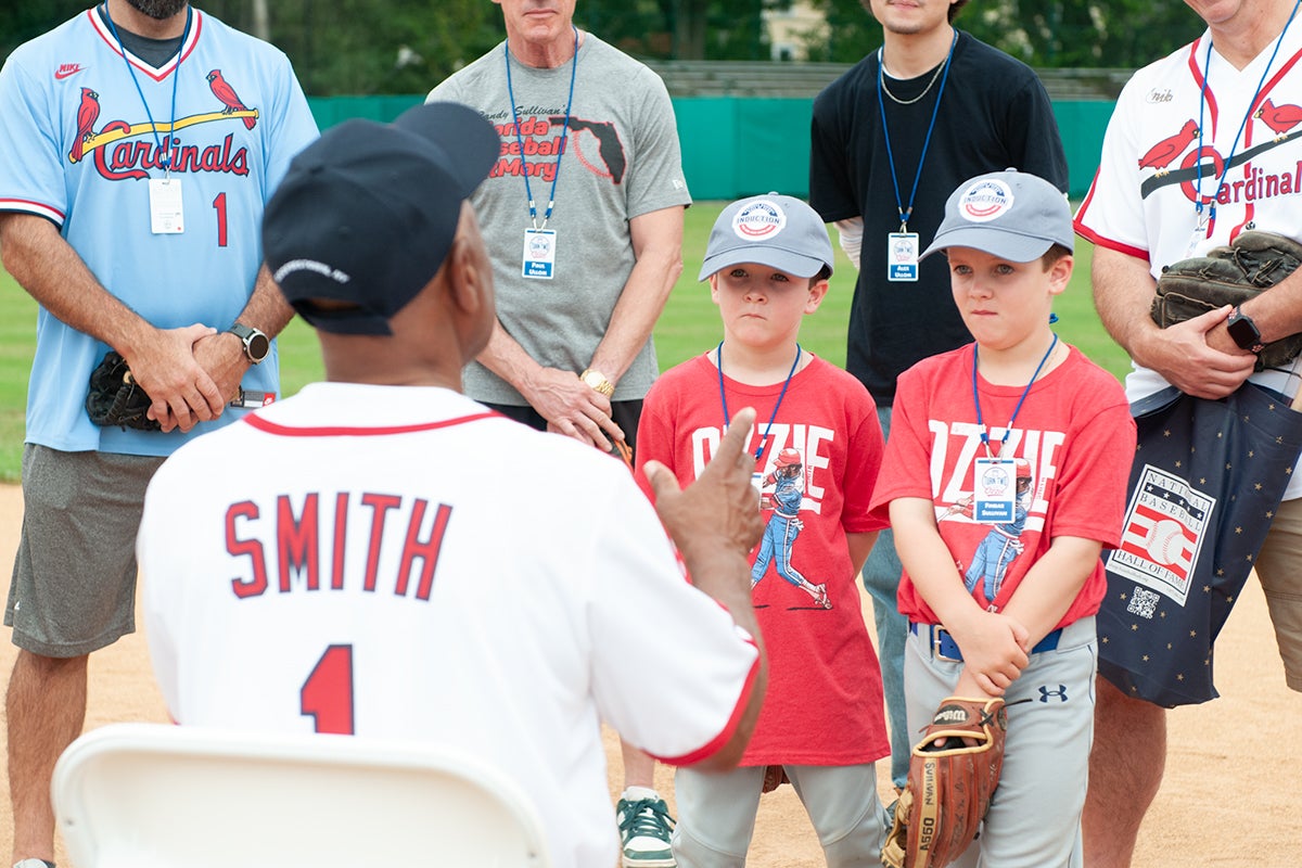 Ozzie Smith with young fans at Turn Two