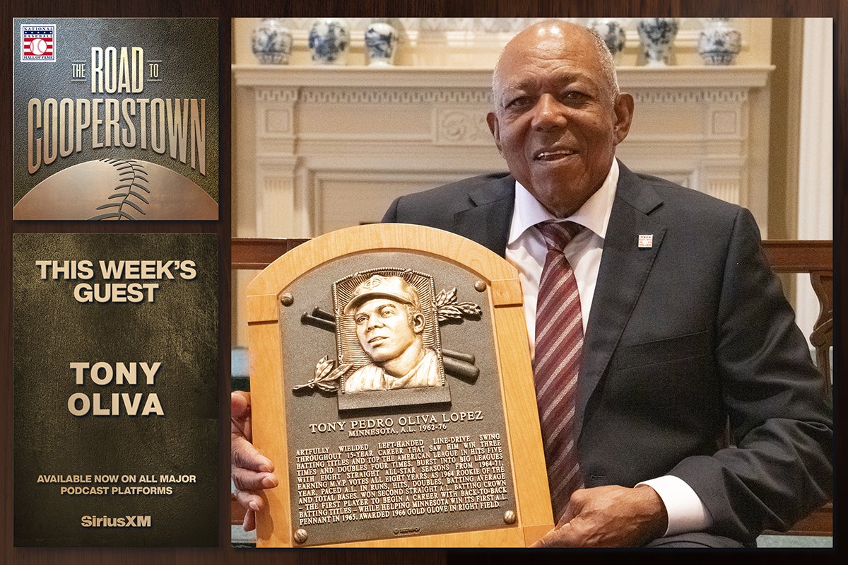 Tony Oliva holding Hall of Fame plaque
