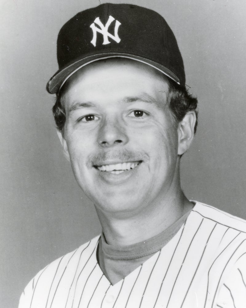 Head and shoulders portrait of Butch Wynegar in Yankees uniform